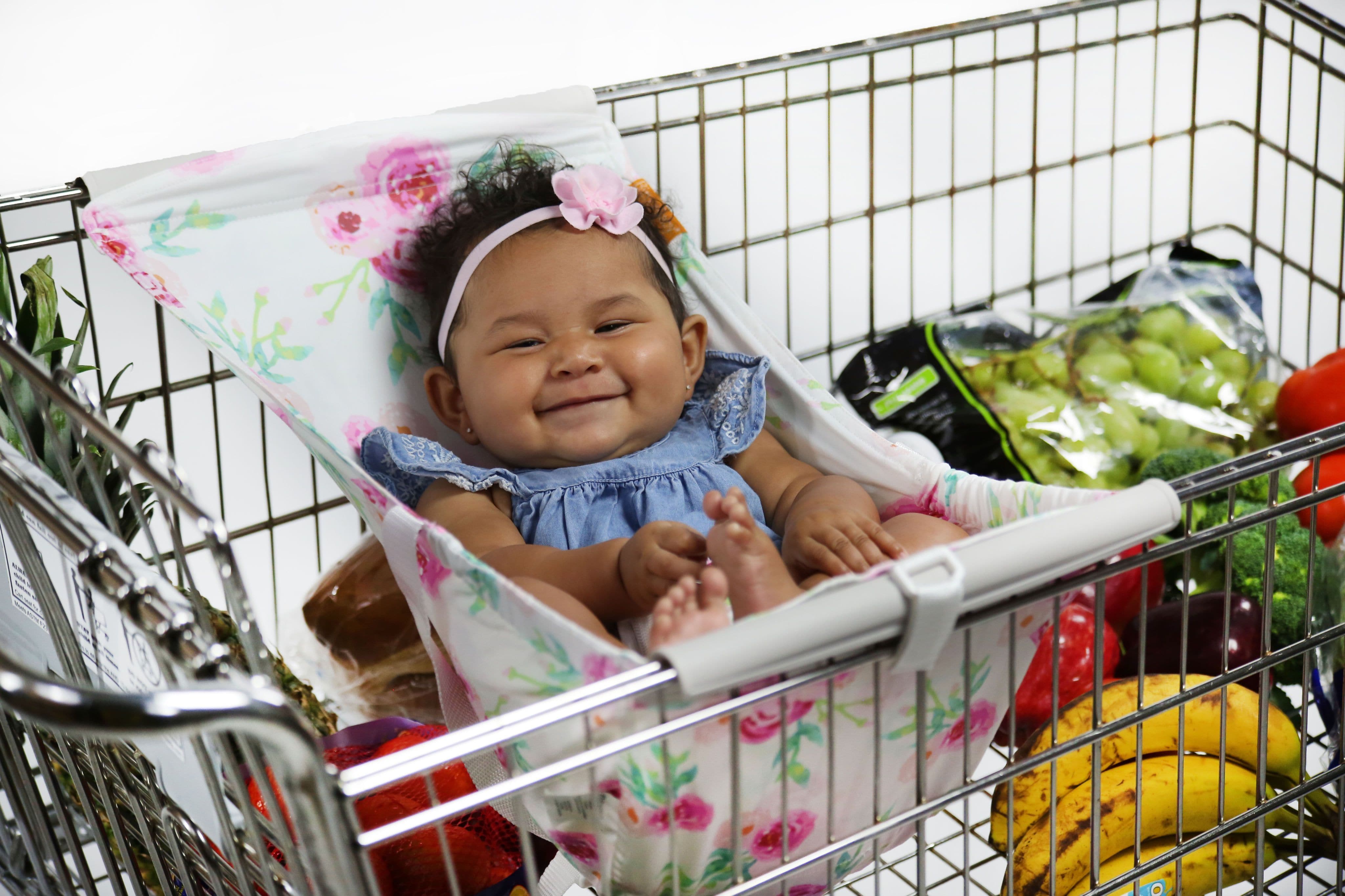 Baby in best sale shopping cart